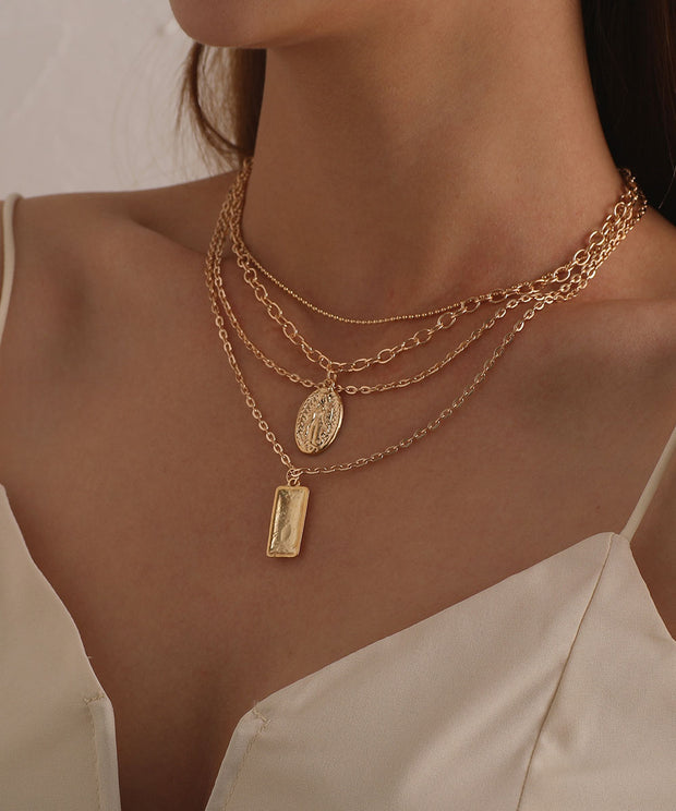 Goldtone Layered Charm & Pendant Necklace