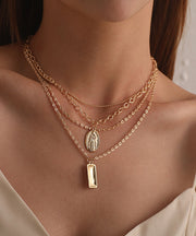 Goldtone Layered Charm & Pendant Necklace